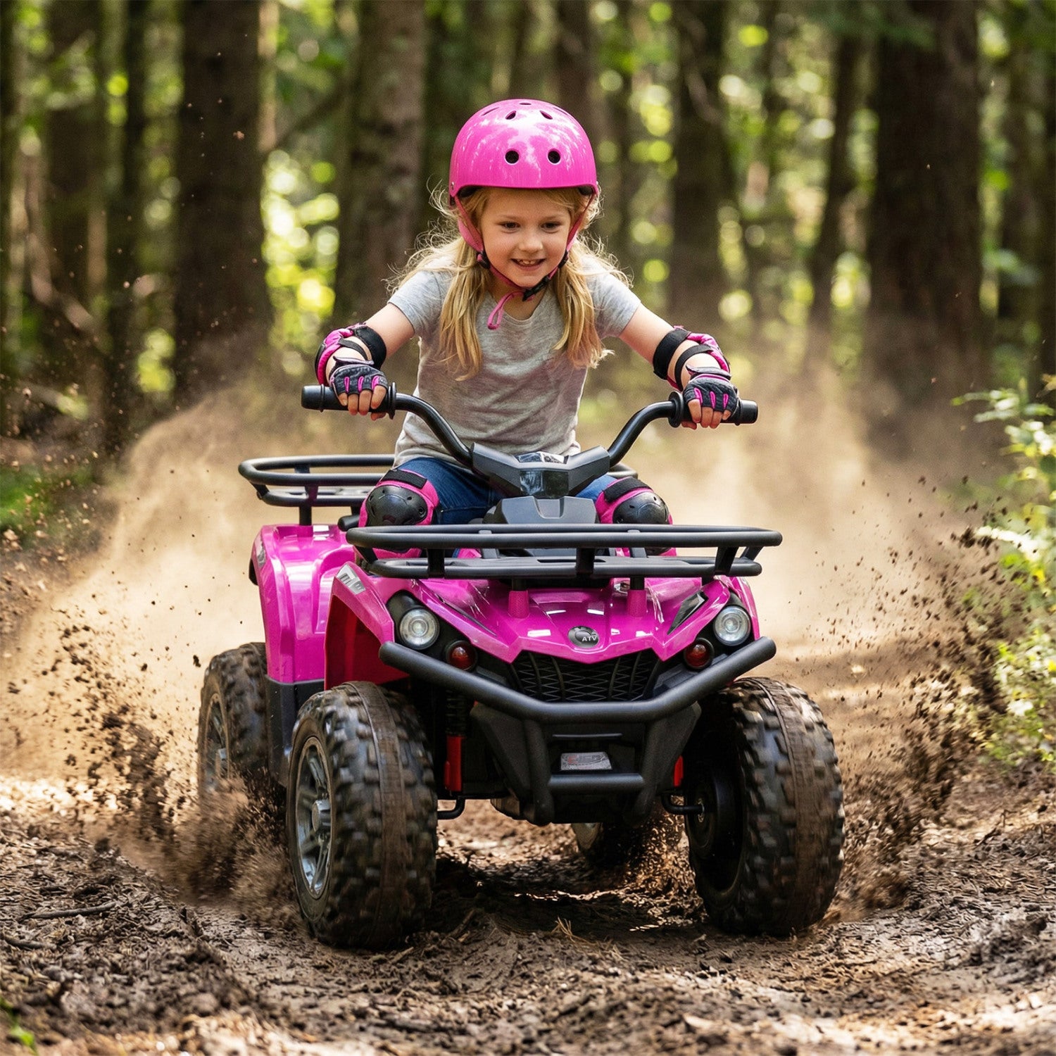 Child riding a pink ATV in a forest