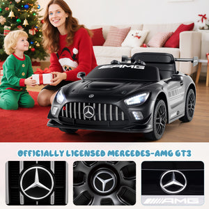 Woman and child with a toy Mercedes-AMG GT3 car in a festive living room.
