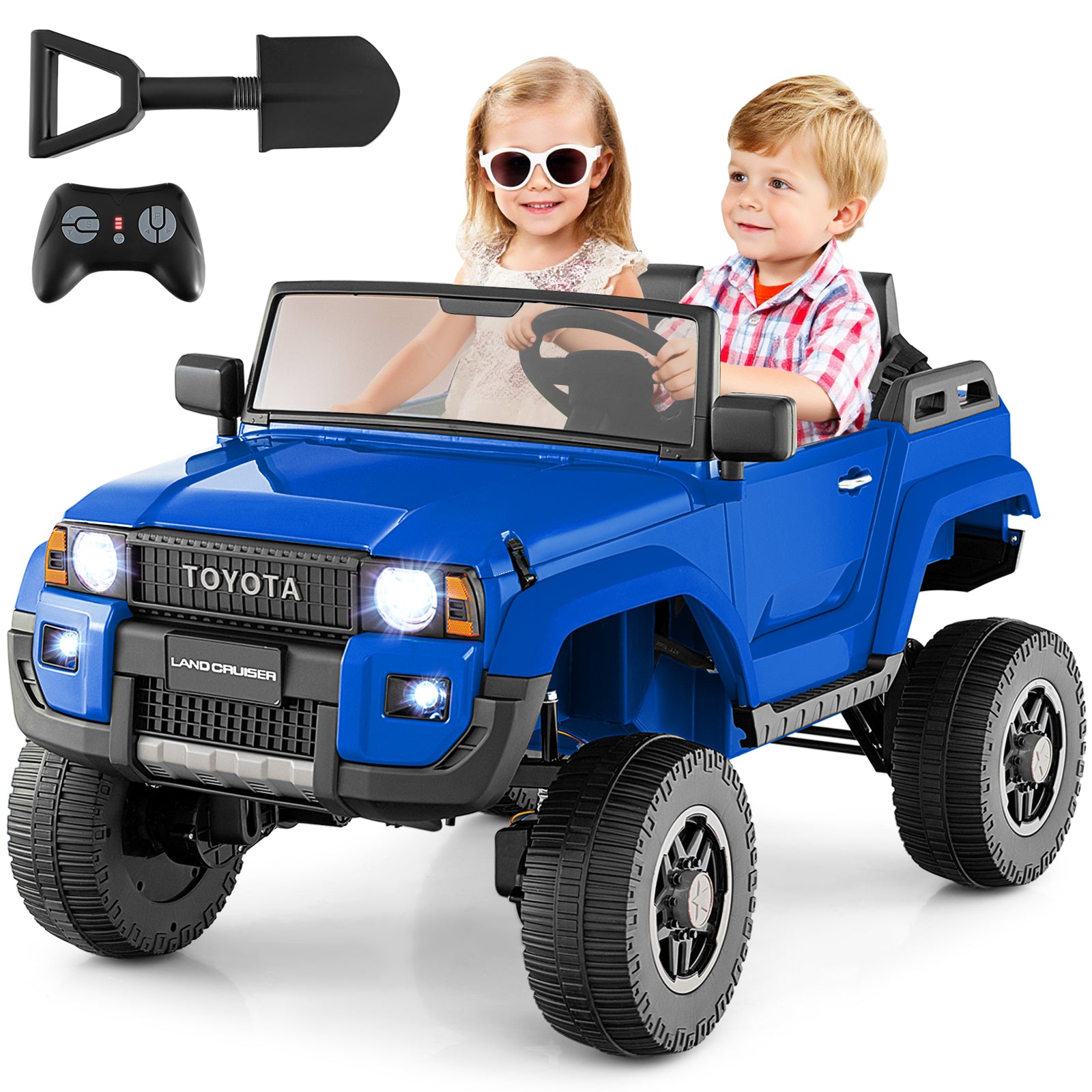 Blue toy car with children inside, remote control, and shovel on a white background