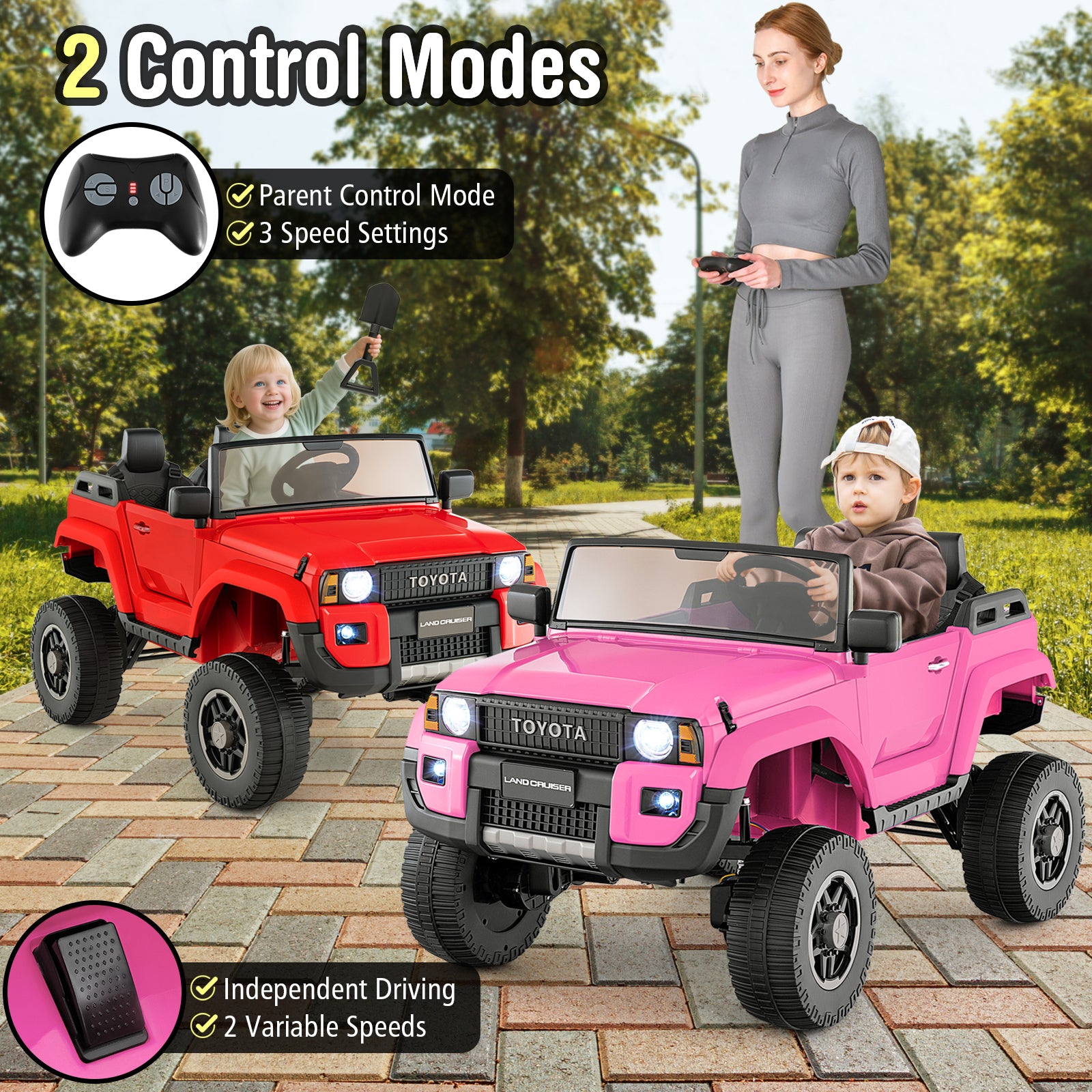 Two toy cars, one red and one pink, with a woman and child in a park-like setting.