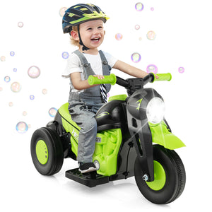 Child riding a green toy motorcycle with bubbles in the background