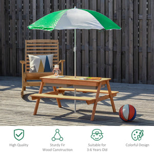 Wooden picnic table with bench, green and white umbrella, and ball on a wooden deck.