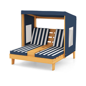 Children's wooden bed with navy and white striped mattress on a white background