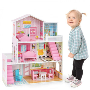 Close-up view of furniture and accessories in dollhouse playset
