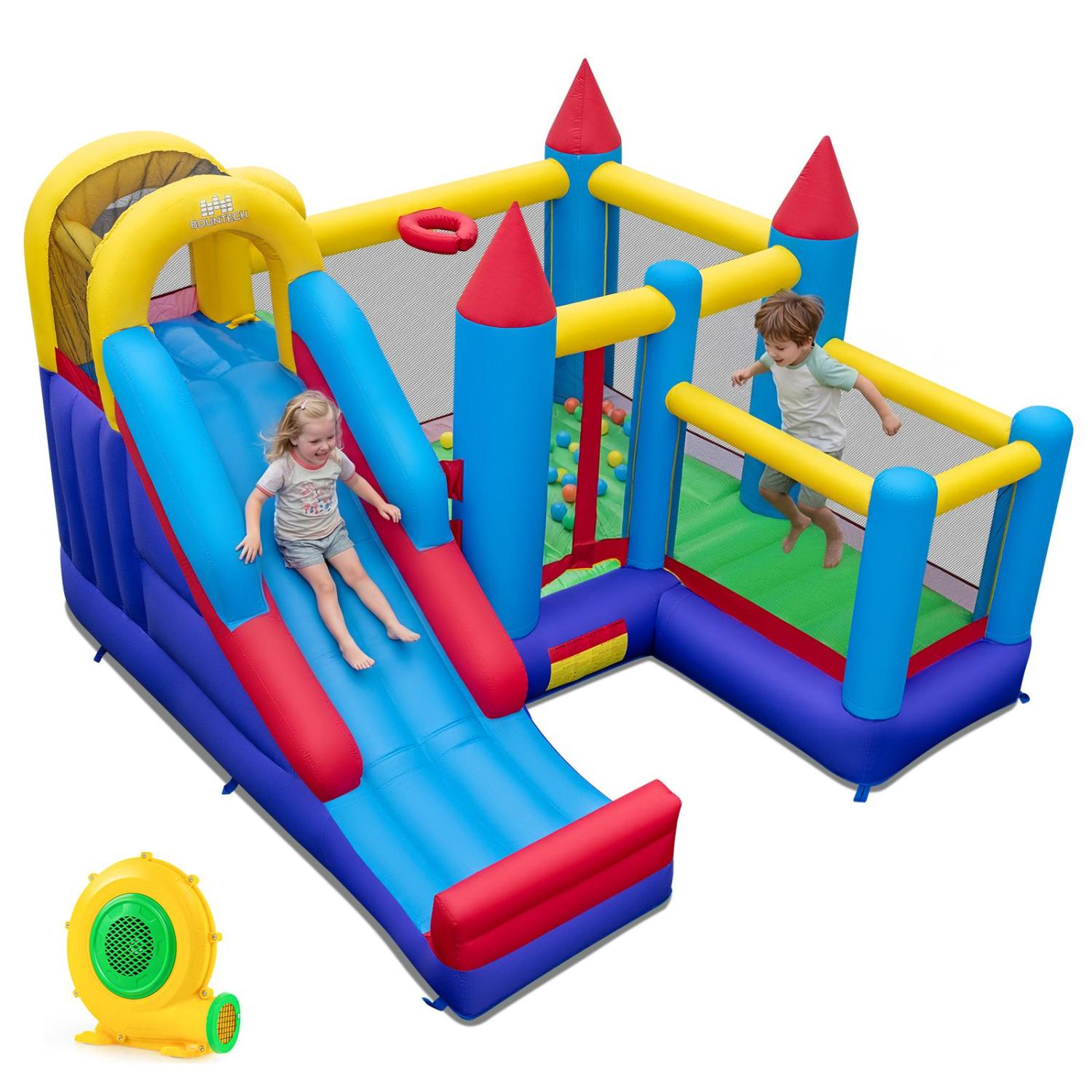 Colorful inflatable playground with slide and castle design, featuring two children playing.