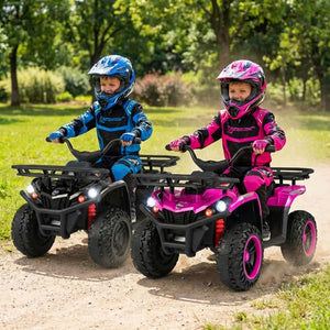 Two children riding toy ATVs on a dirt path with trees in the background