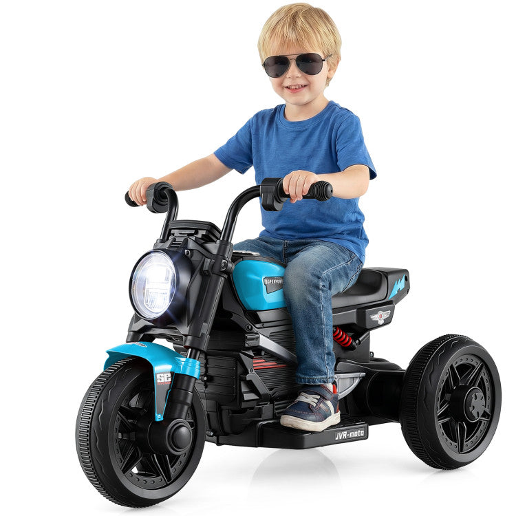 Child riding a toy motorcycle with blue accents on a white background