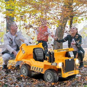 Children's toy dump truck in a park with children playing in the background