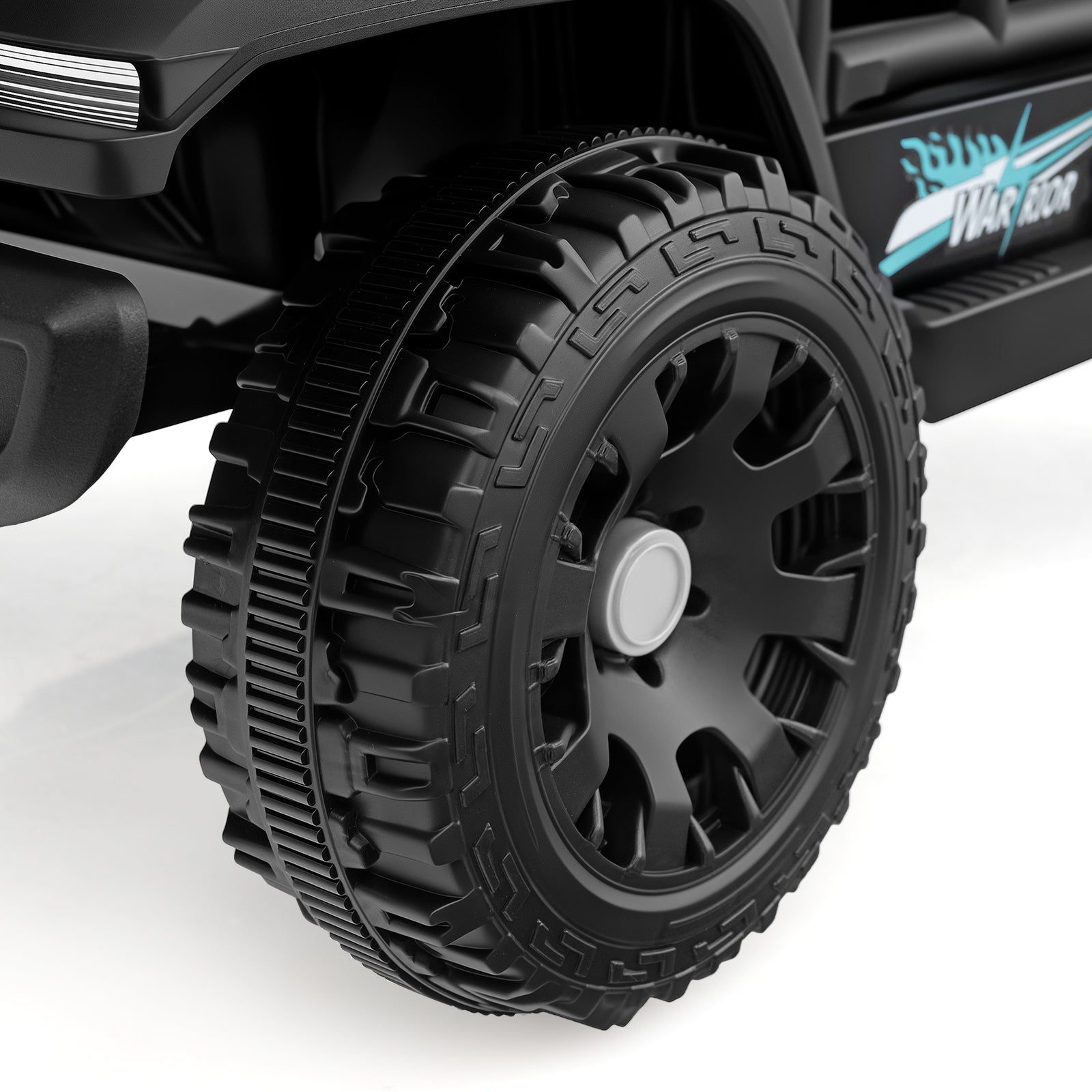 Close-up of a black off-road vehicle tire with detailed tread pattern on a white background