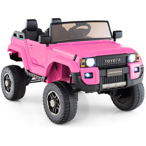 Pink toy car with Toyota branding on a white background