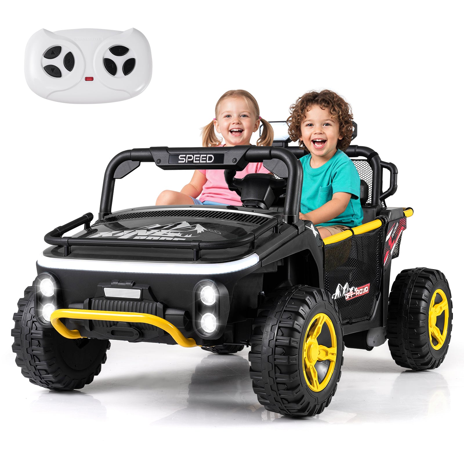 Children sitting in a toy car with a remote control on a white background