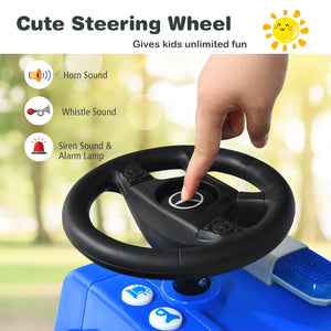 Toy steering wheel with sound effects and horn button, used by a child's hand.