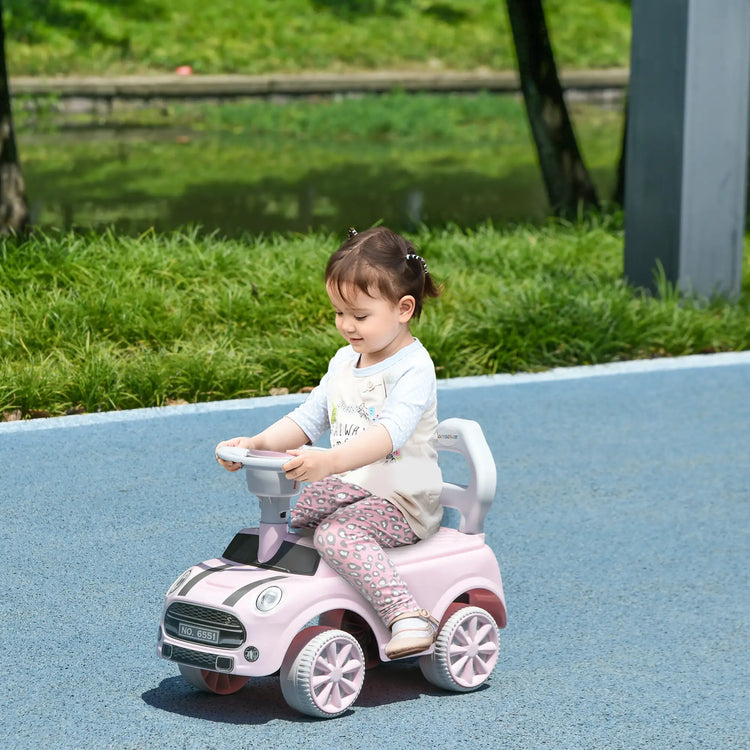 Toddler ride-on car front view showing steering wheel and horn