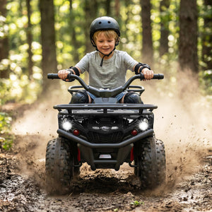 Child riding a ATV in a forest