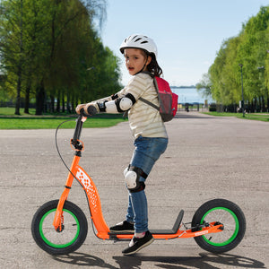 Child riding an orange scooter on a path with trees and water in the background