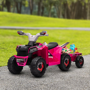 Pink toy ATV with a trailer on a gravel path in a park
