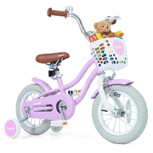 Pink children's bicycle with a basket containing toys on a white background