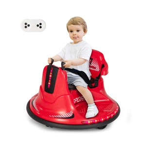 Child sitting on a red toy car with a white background