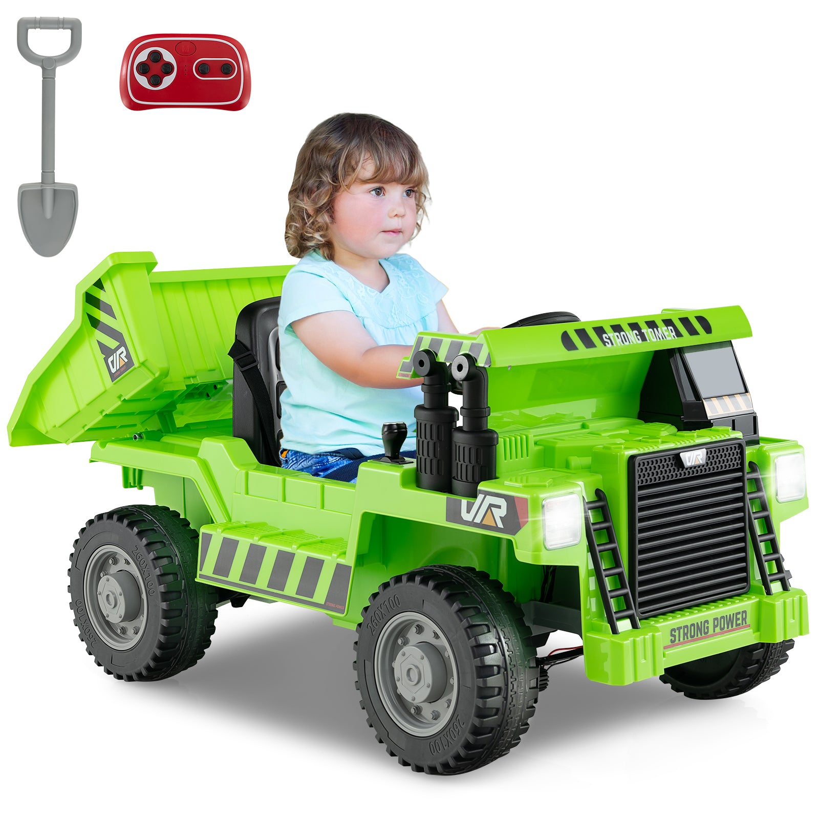 Child playing with a green toy dump truck on a white background