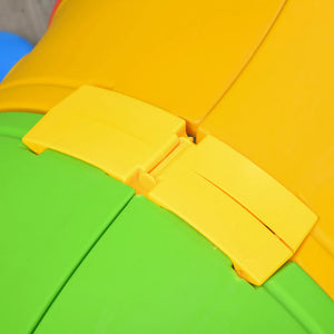 Close-up of a colorful plastic toy with yellow and green sections.