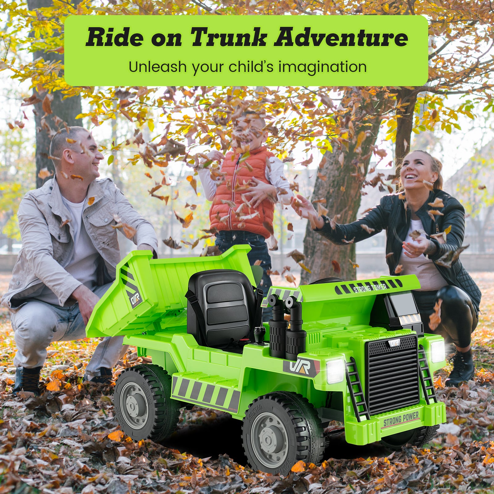 Green ride-on toy truck in a park with children and adults playing around it.