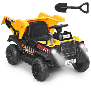 Toy dump truck with black shovel on a white background