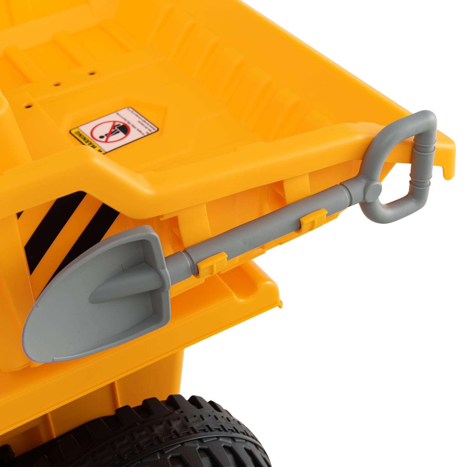 Yellow toy dump truck with a gray shovel on a white background