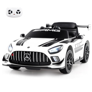 White toy car with Mercedes-Benz logo and AMG branding on a white background
