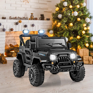 Toy jeep with lights in a room decorated for Christmas.