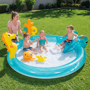 Inflatable outdoor water park with slide and splash pool