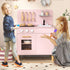 Wooden kids play kitchen with accessories and storage