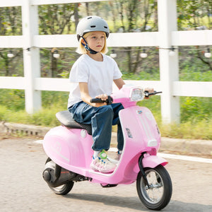 Kids motorcycle riding smoothly on grass surface