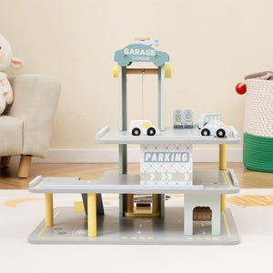 Kids multi-level parking garage playset with elevator and helipad