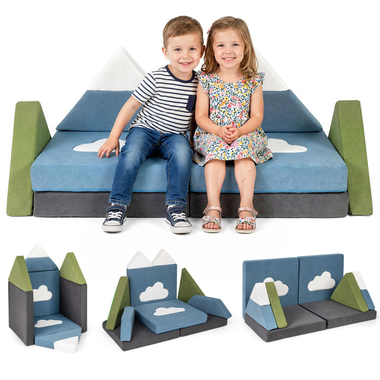 Children sitting on a blue and green play set with cloud designs.
