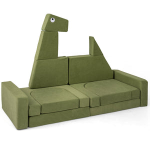 Green dinosaur-shaped sofa on a white background