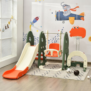 Children's playset with slide, swing, and climbing structure in a room with colorful wall art.
