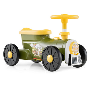 Toy vehicle with green body, yellow accents, and black wheels on a white background