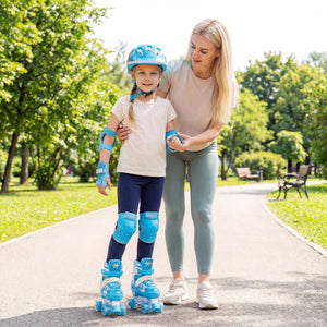 Woman helping a young girl with roller skates in a park