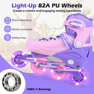 Purple and pink roller skates with light-up wheels on a white background