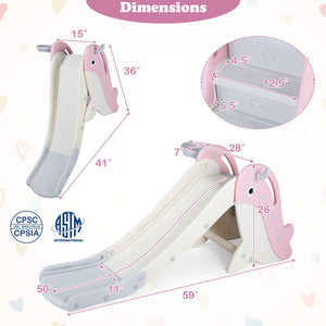 Pink and cream whale-shaped children's slide with dimension annotations showing measurements from multiple angles, including a circular inset detail of the stair tread and a safety certification logo.