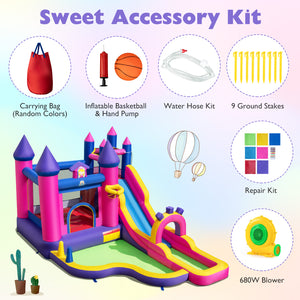 Colorful inflatable castle with accessories on a light purple background