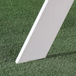 White rectangular tile on artificial grass