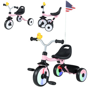 Pink children's tricycle with colorful wheels on a white background