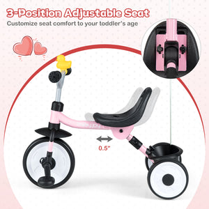 Pink balance bike with adjustable seat on a white background