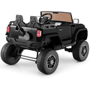 Black toy truck with large wheels on a white background