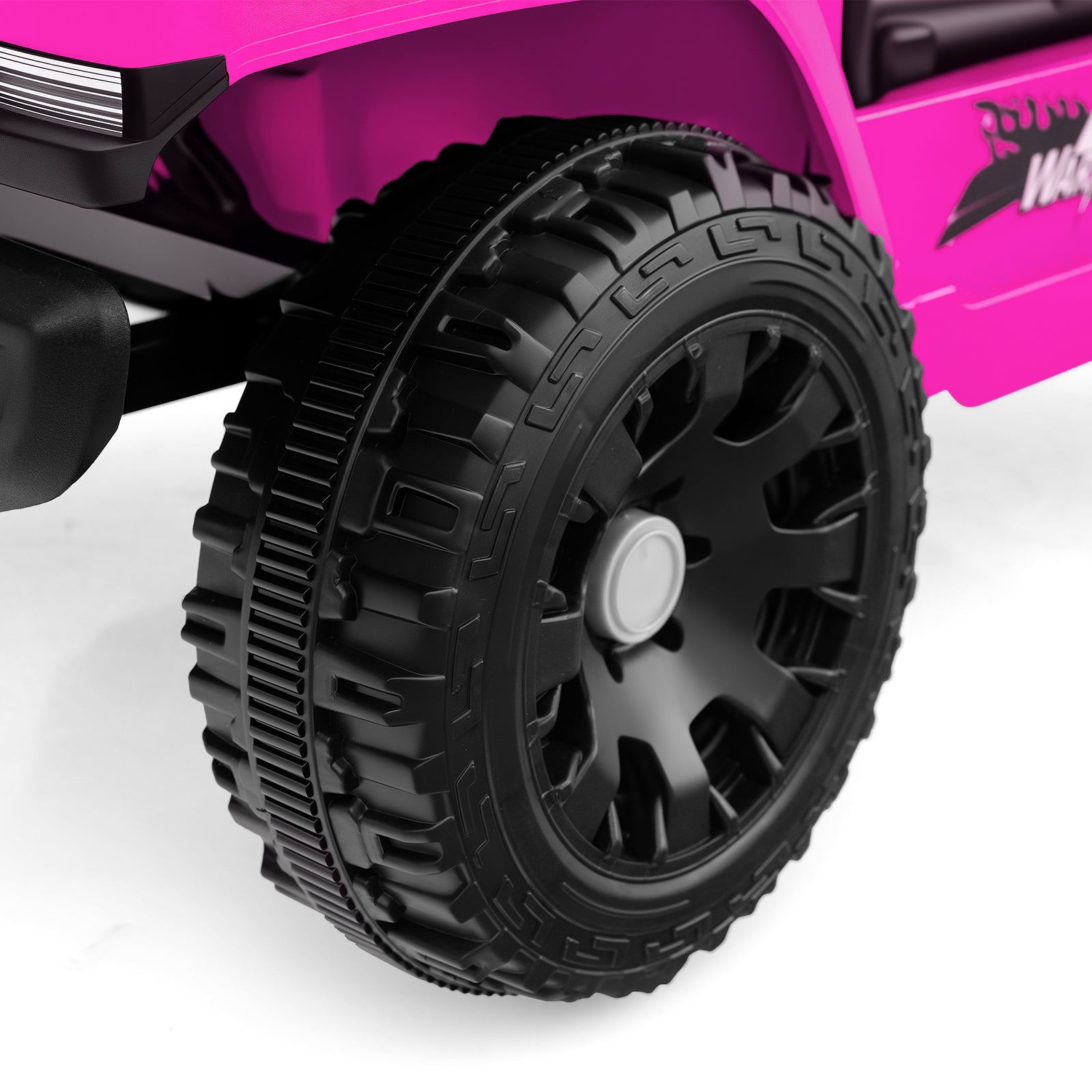Close-up of a pink toy truck with a black tire on a white background