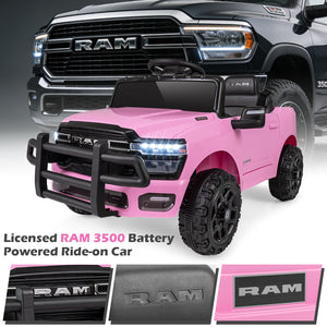 Pink battery-powered ride-on car with RAM branding in front of a black RAM truck.