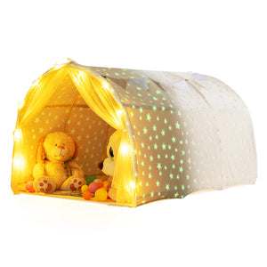 Children's play tent with glowing stars and toys inside on a white background