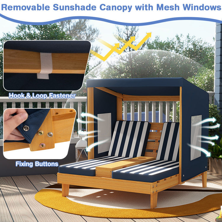 Wooden outdoor lounge chair with a removable sunshade canopy on a deck.