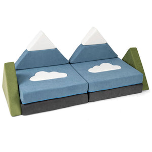 Children's play set with mountain and cloud design on a white background